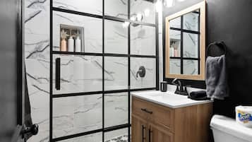 Shower, towels, soap, shampoo