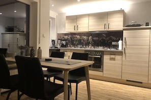 Apartment | Private kitchen | Oven, electric kettle, toaster