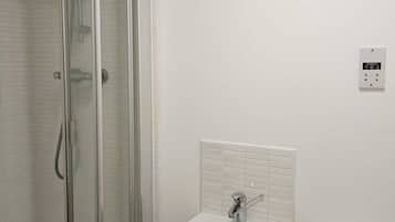 Shower, towels, toilet paper