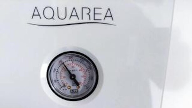 A gauge with the brand name 'AQUAREA' on a white surface. - 5 Star Holiday Home in Nysted (Nysted)