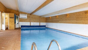 An indoor swimming pool with wooden walls and a tiled floor. - 24 Person Holiday Home in Laeso-by Traum (Læsø)