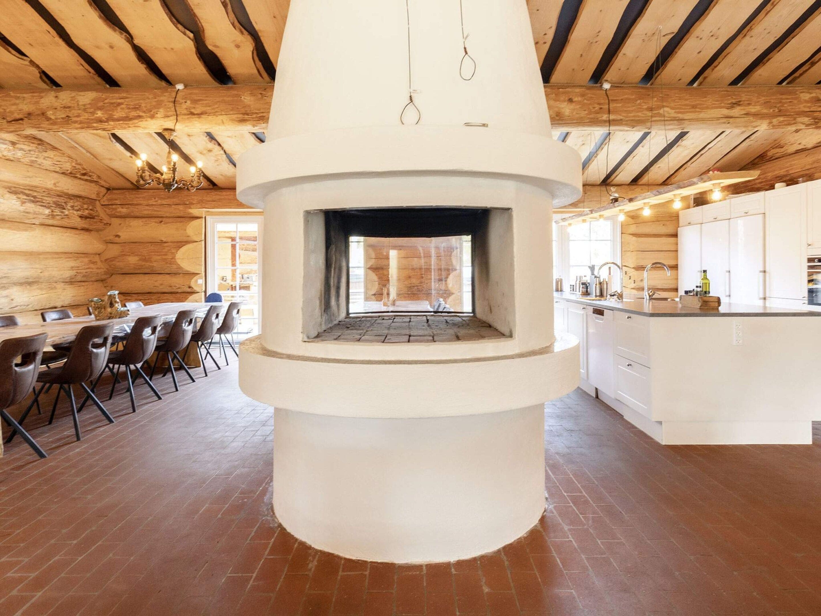 A modern kitchen with white cabinets and a central island.