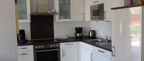 Apartment | Private kitchen | Oven, toaster, highchair