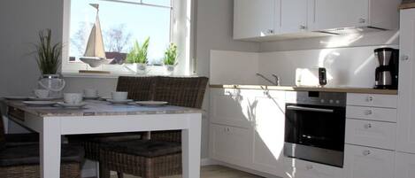 Apartment | Private kitchen | Oven, electric kettle, toaster