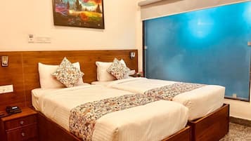 Deluxe Double or Twin Room, City View | Minibar, in-room safe, iron/ironing board, free WiFi