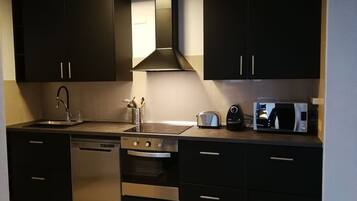 Apartament | Cuina privada | Forn i torradora