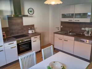 Apartamento | Cocina privada | Horno, hervidor eléctrico y tostadora
