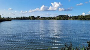 A calm lake with a clear sky and scattered clouds. - 4 Star Holiday Home in Faaborg (Faaborg)