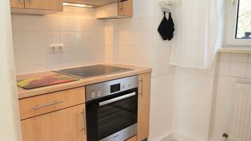 Apartment | Private kitchen | Oven, electric kettle, toaster