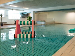 Swimmers can enjoy a safe and refreshing experience in this pool area with a clear view of the pool floor.