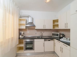 Apartment | Private kitchen | Fridge, microwave, oven, stovetop - Apartment Stipic Omis - Three Bedroom Apartment With Terrace (Omis)