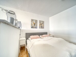 Maison | 1 chambre, fer et planche à repasser
