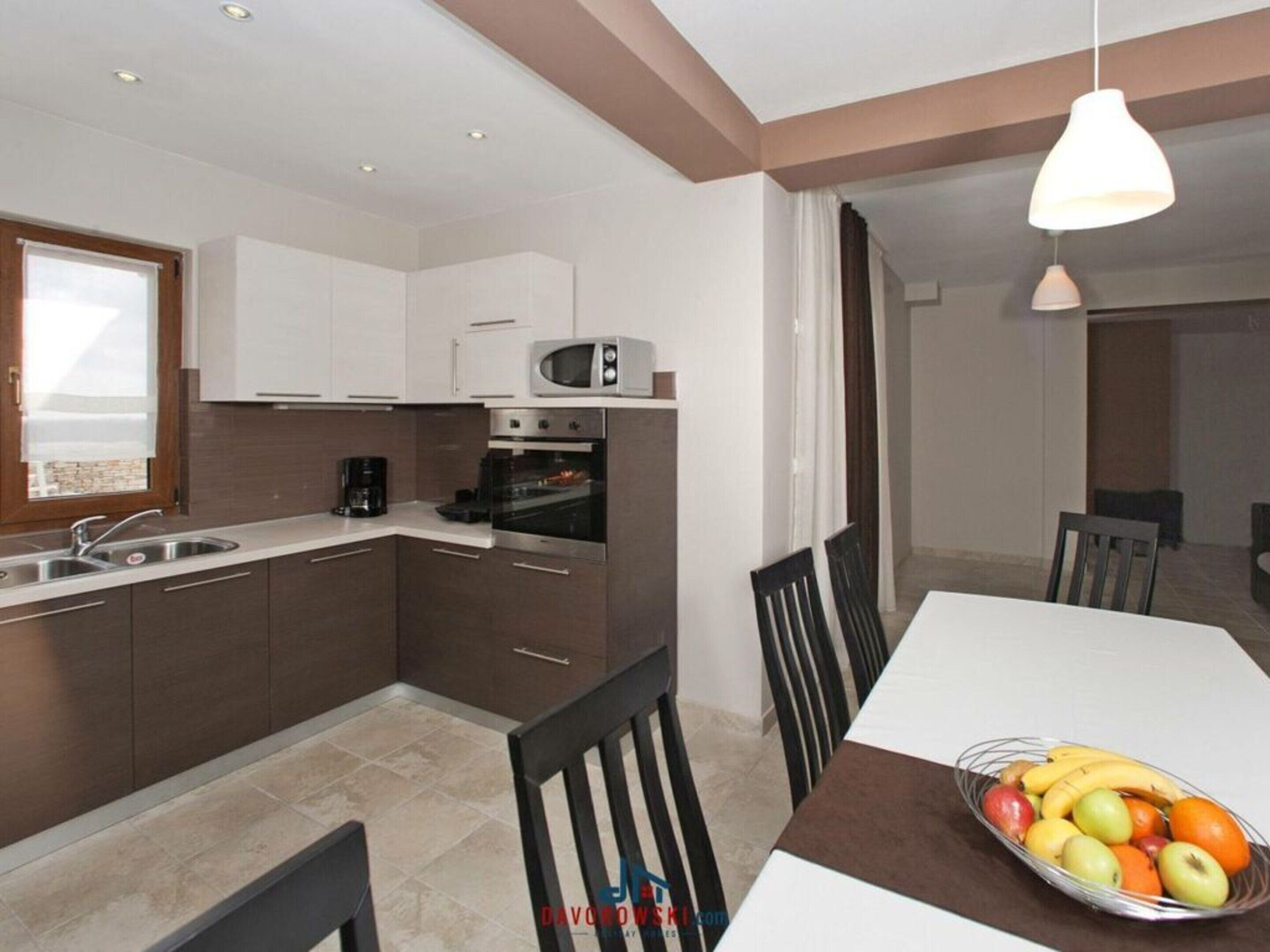 Villa | Private kitchen | Oven, electric kettle, toaster
