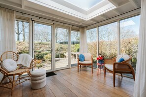 Bungalow | Living area - Holiday Bungalow With a Nice Light Appearance at 1.5 km From the Beach (Ouddorp)