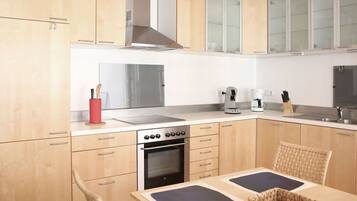 Apartment | Private kitchen | Oven, electric kettle, toaster