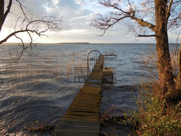 Guests can walk along the pier, taking in the serene surroundings and enjoying the views of the lake or river.