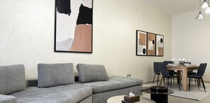 Design Apartment, 3 Bedrooms | Living area | Flat-screen TV - Kease Qurtubah A-1 Royal Design AX34 (Riyadh)