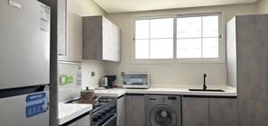 Design Apartment, 3 Bedrooms | Private kitchen | Electric kettle - Kease Qurtubah A-1 Royal Design AX34 (Riyadh)