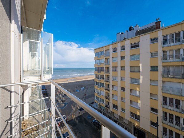 Enjoy stunning ocean views from your balcony overlooking the beach.