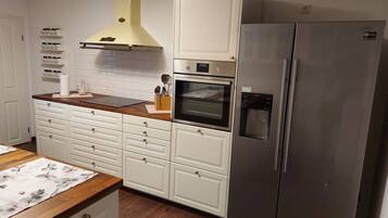 Apartment | Private kitchen | Oven, electric kettle, toaster