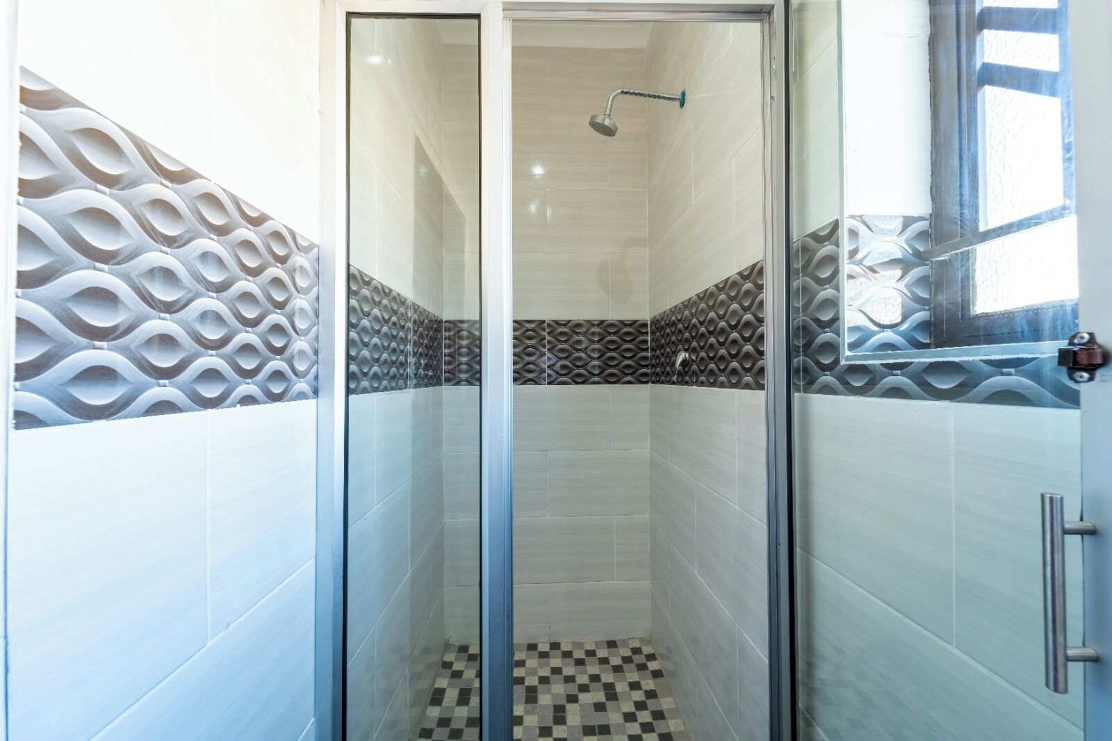 Shower, eco-friendly toiletries, towels, soap