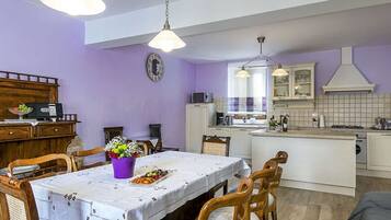 Villa | Private kitchen | Oven, dishwasher, electric kettle, toaster