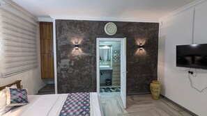 1 habitación, tabla de planchar con plancha, wifi gratis y ropa de cama 