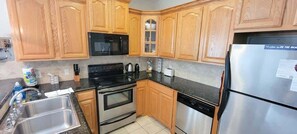 Apartment, 2 Bedrooms | Private kitchen | Fridge, oven, coffee/tea maker, toaster - Beach & Palms Condo 2 Bedroom Condo by RedAwning (South Padre Island)