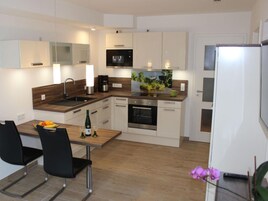 Apartamento | Cocina privada | Horno, hervidor eléctrico y tostadora