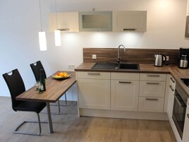 Apartamento | Cocina privada | Horno, hervidor eléctrico y tostadora