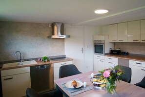 Apartment | Private kitchen | Oven, electric kettle, toaster