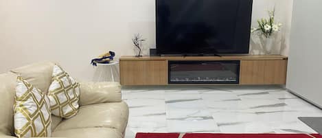 Smart TV, fireplace, foosball