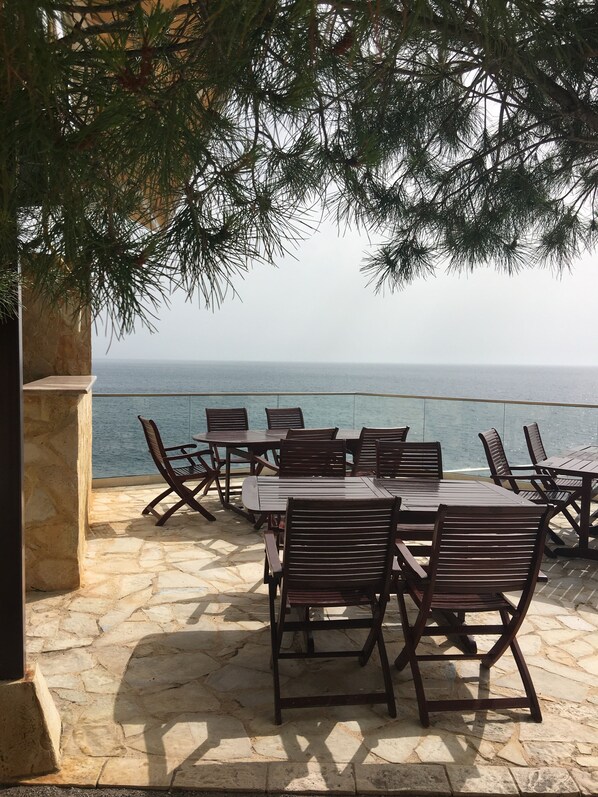 Outdoor dining - Cozy apartment with the gorgeous sea view, pool and private beach (Dobra Voda)