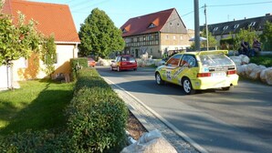 A yellow car with "Coffee House" branding on a residential street. - Saalendorf - Holidays (Grossschoenau)