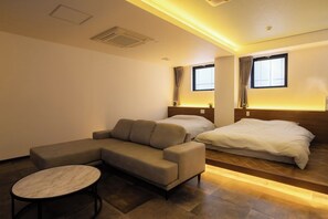 Suite Deluxe, 2 camas Queen size, baño privado, en edificio contiguo | 1 habitación, escritorio y espacio para trabajar con laptop 