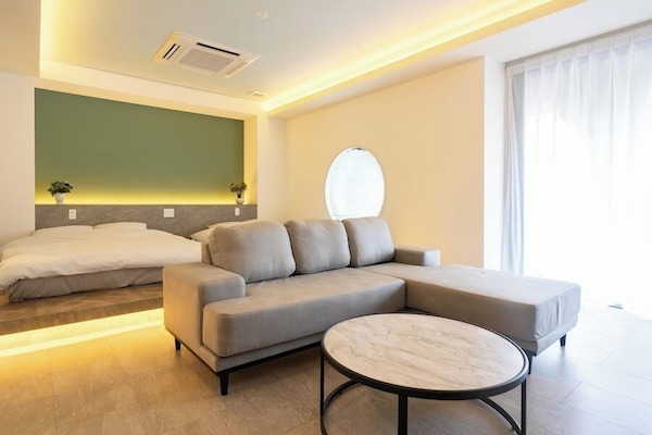 Deluxe Suite, 2 Queen Beds, Private Bathroom, Annex Building | 1 bedroom, desk, laptop workspace, free WiFi