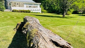 A house with a large porch and a well-maintained lawn. - 10 Person Holiday Home in Brastad-by Traum (Brastad)