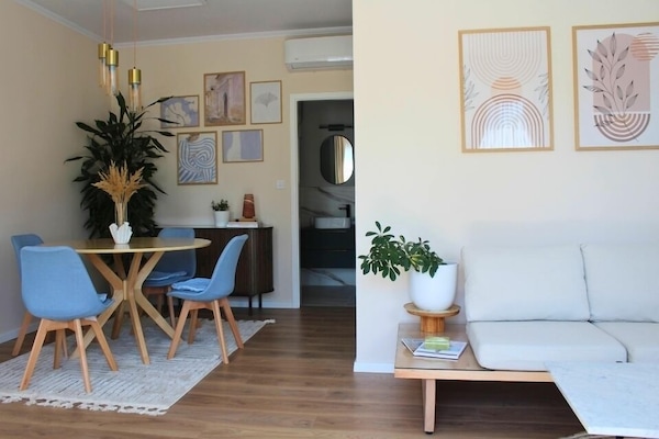 Signature suite, uitzicht op tuin | Woonruimte