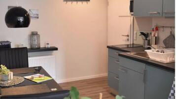 Apartment | Private kitchen | Oven, electric kettle, toaster