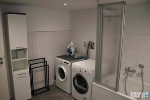 Hair dryer, towels, soap, toilet paper