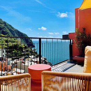 Apartamento superior, vistas al mar | Terraza o patio