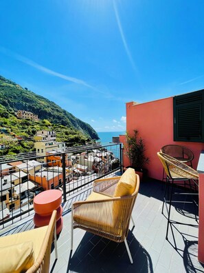 Apartamento superior, vistas al mar | Terraza o patio
