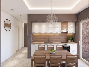 Appartement | Cuisine privée | Réfrigérateur, four à micro-ondes, un four, surface de cuisson