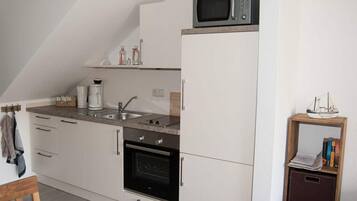 Apartment | Private kitchen | Oven, electric kettle, toaster