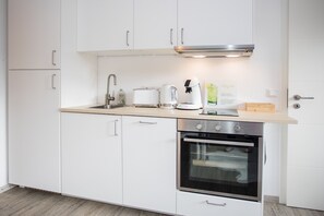 Apartamento | Cozinha privada | Cadeirão de bebê