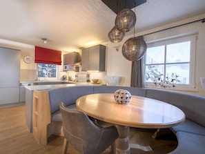 Enjoy cooking in this well-lit kitchen with a spacious island and bench.