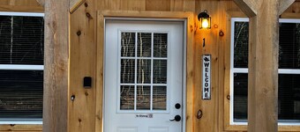 Cozy cabin rental located on the atv & snowmobile trail. Family & Pet friendly