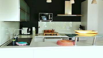 Apartment | Private kitchen | Oven, electric kettle, high chair