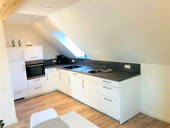 Apartment | Private kitchen | Oven, electric kettle, toaster