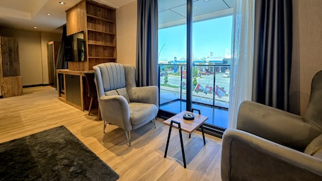 Family Room | 1 bedroom, premium bedding, in-room safe, individually decorated